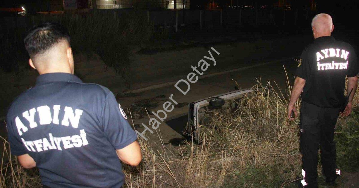 "Aydın'da Korkutan Anlar: Kontrolden Çıkan Otomobil Kanala Uçtu!" başlıklı haber için fotorealistik,